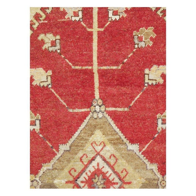 A vintage Turkish Oushak accent rug handmade during the mid-20th century. Measures: 5' 5" x 9' 2".
