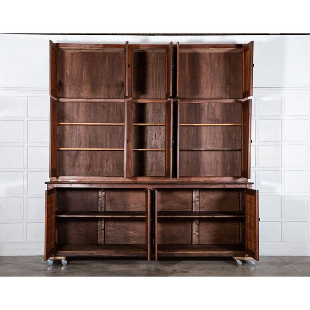 Circa 1890 monumental 19thc french monastery pine housekeepers cupboard together w301 x d78 x h312 cm base w301 x d78 x...