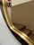This sleek round mirror features either in Macassar Ebony or lacquered frame. The exterior lines of the frame are a clean...