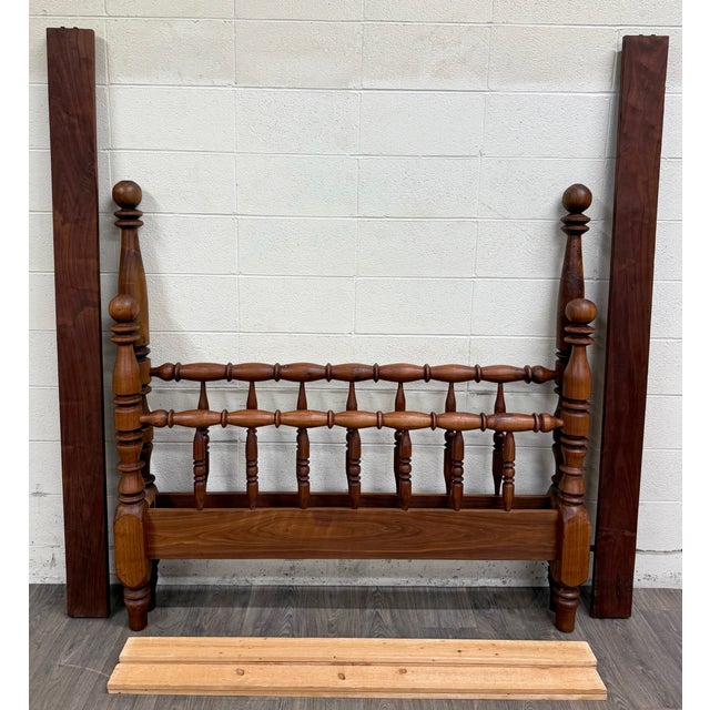 This is an absolutely stunning vintage full-sized Jenny Lind spindle bed or spool bed with stunningly turned cannonball...