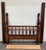 This is an absolutely stunning vintage full-sized Jenny Lind spindle bed or spool bed with stunningly turned cannonball...