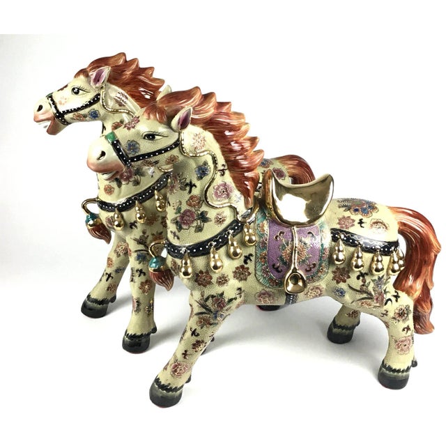 Absolutely breathtaking pair of hand painted Porcelain horses from the 80’s. Large and both are acting like they want to...