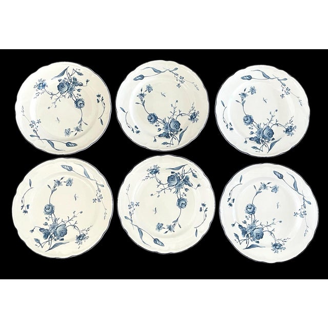 The Nikko French Country Antoinette Blue China 10.5 Dinner Plates are a set of 6 round, glossy bone china plates featuring...