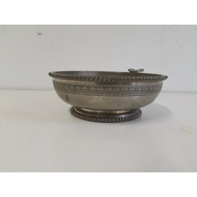 Classically inspired pewter ashtray made in France. Exquisitely engraved with lily motif. Discovered in Northern France....