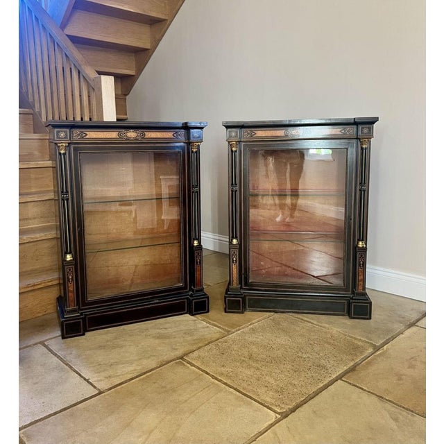 Pair of antique Victorian quality ebonised and amboyna inlaid side cabinets, having ebonised tops above an amboyna inlaid...