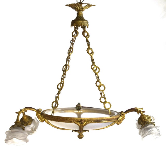 This early 20th-century pendant chandelier was crafted in the Neoclassical style, which originated in Europe in the early...