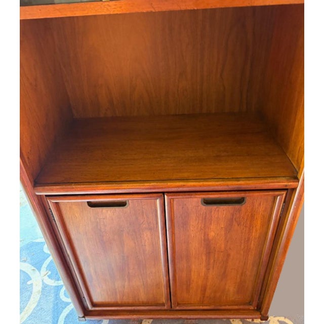 Beautiful Stanley Mid-Century Modern china cabinet featuring sliding glass doors on the upper hutch and lower cabinets...