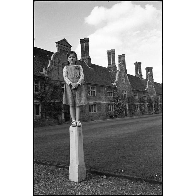 Edition 2/10 - Girl on Pillar, Blickling Esate, Norfolk Photograph Analogue Film Photography. Paul Cooklin is a renowned...