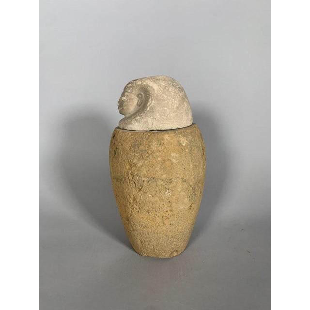 Ancient Egyptian Canopic Vase, Late Period (711-332 BC), terracotta body surmounted by a stone stopper depicting Amset as...