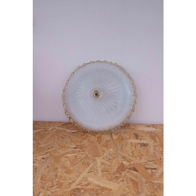 Stunning yelllow and transparent/silver Murano ceiling light. The ceiling light consists of two glass elements, the...