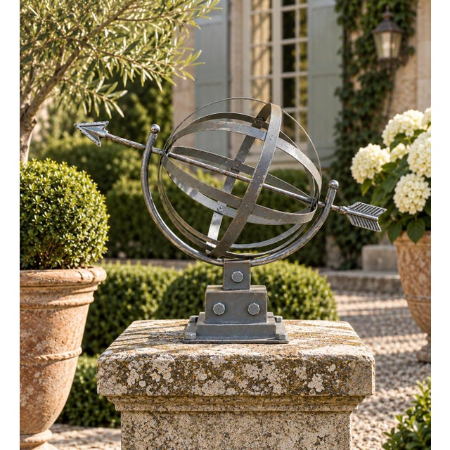 A stunning contemporary iron garden armillary sundial beautifully crafted in the brutalist style. Pieces like this are...