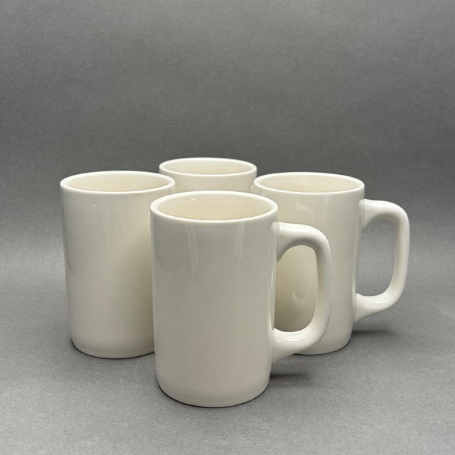 This set of four heavy-duty restaurant ware mugs features a classic design and sturdy handles, perfect for serving Irish...