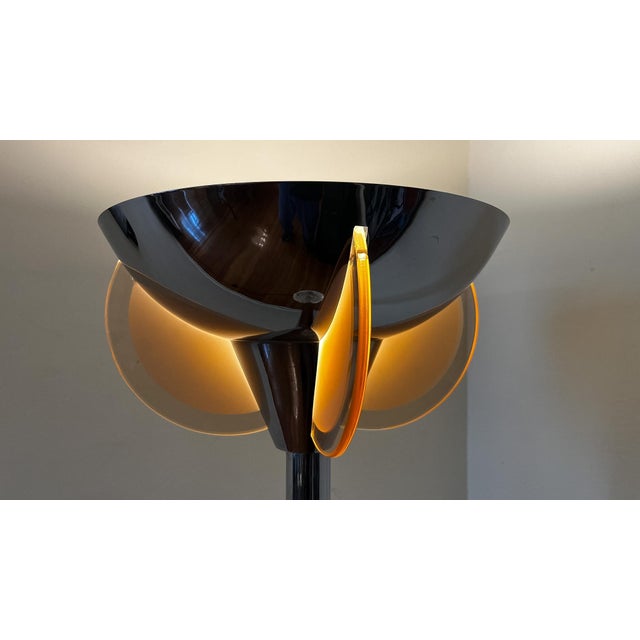 The typical chrome-plated Art Deco floor lamp has four glass panes made of partially satin-finished, rose-colored glass,...