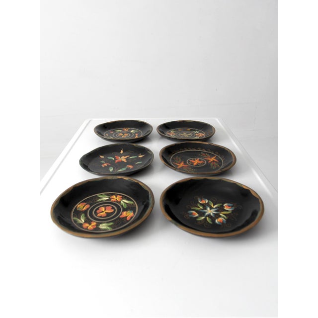 Set of six vintage Scandinavian decorative plates featuring hand-painted floral motifs inspired by the Rosemaling...