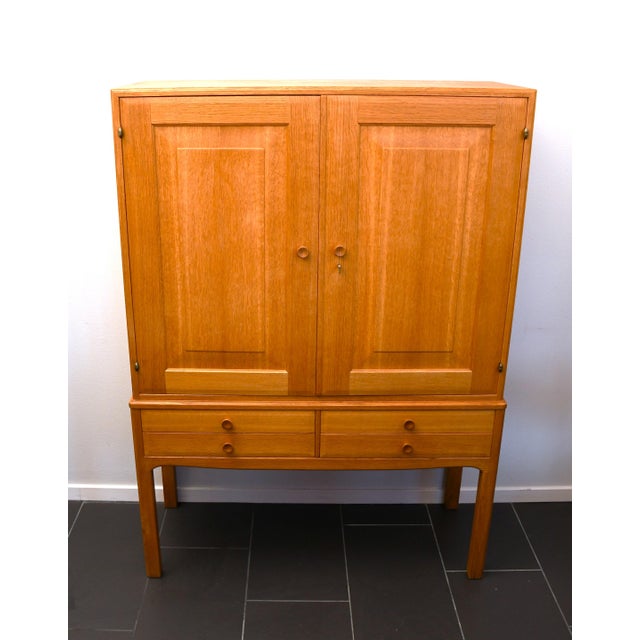 Swedish Oak Cabinet by Carl Malmsten for Carl Löfving & Söner AB. Fine and rare cabinet made in the 1970-1980s by great...