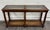 This is a beautiful vintage Mid Century Traditional walnut console table or hall table featuring two inset glass display...