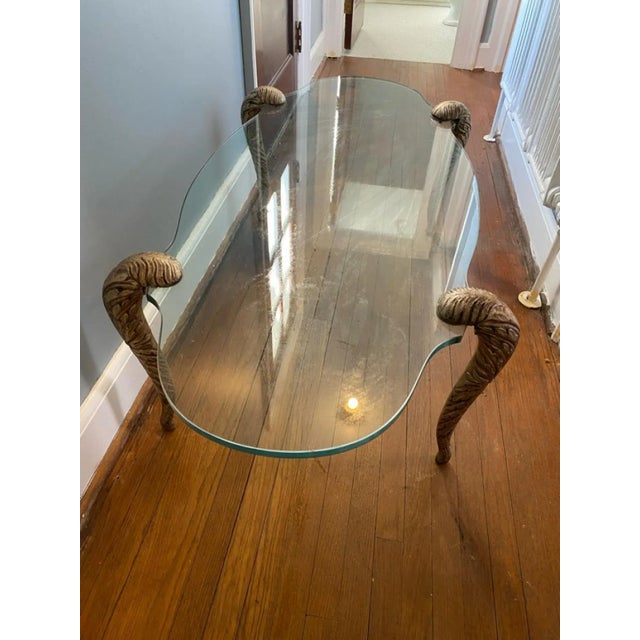 Corseted Glass Coffee Table With Four Gilt Carved Wood Cabriole Legs Designed In The 1960's In The Manner Of Maison Jansen.