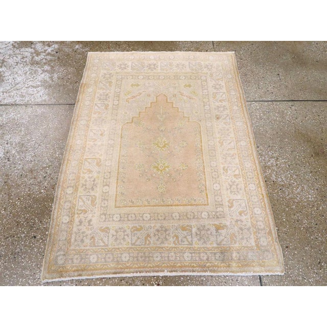 An antique Turkish Sivas throw rug. Originally ascribed to Sivas in eastern Turkey, this scatter in a prayer layout could...