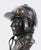 Marcel Jovine (1921-2003), Bust of a Jockey patinated bronze, 1978, signed and dated in casting, 10 in. high Born 1921...