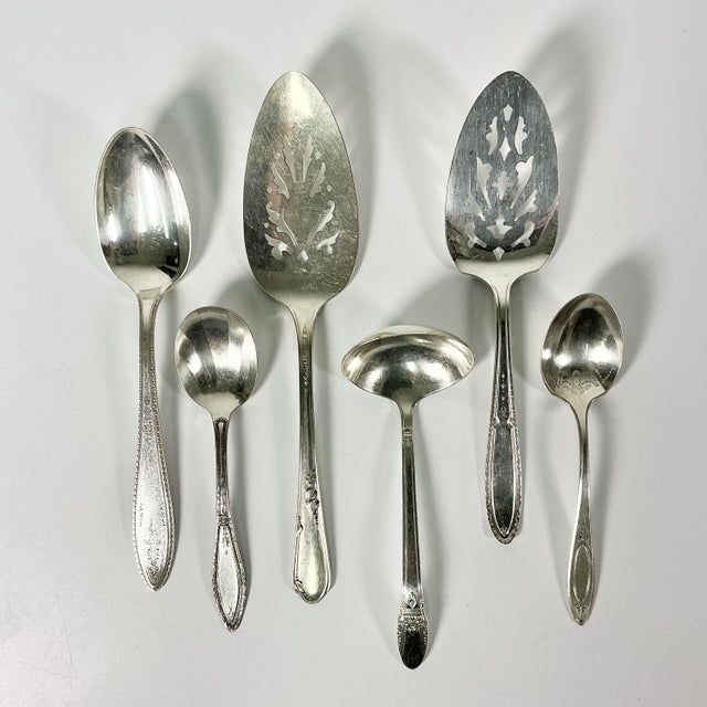 Just in time for seasonal entertaining and dining, we are pleased to offer this set of 6 Silverplate Serving Utensils....