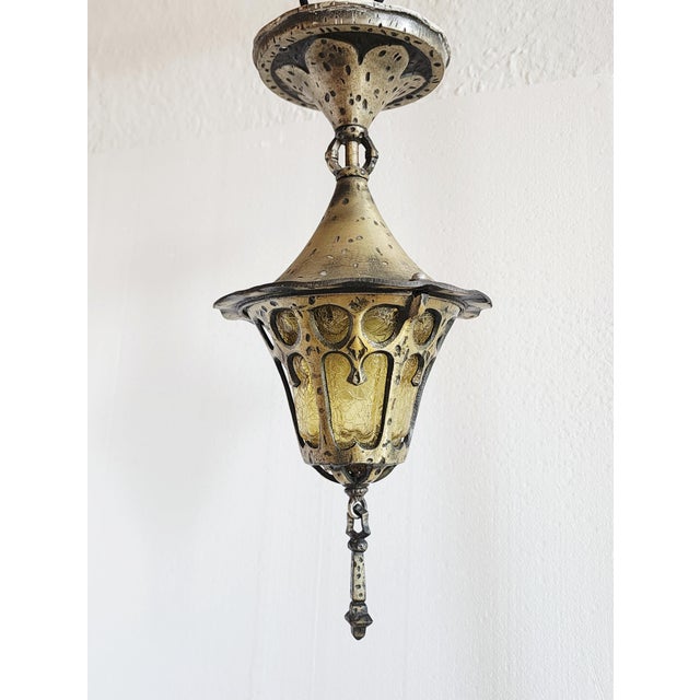 Antique 1930's metal and amber glass lantern made by the Lincoln Lighting company of Detroit, Michigan. The storybook Art...