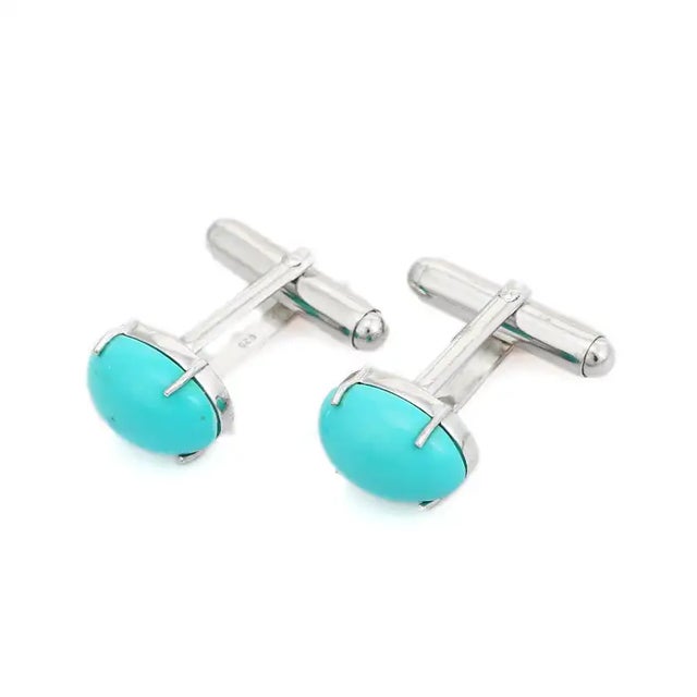 These men’s cufflinks from Carat&her feature beautiful 13x10 mm oval turquoise gemstones set in genuine 925 sterling...