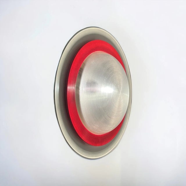 Dive into the nostalgia of the 1980s with the rare ‘Sat 50’ flush mount lamp by Luci Milano, a true gem of vintage design....