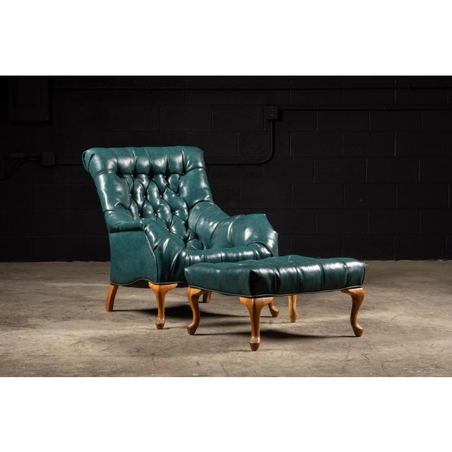 This vintage tufted chair and ottoman set is a deep aqua color and appears to be naugahyde. Ottoman: 13" H x 26" W x 21" L...
