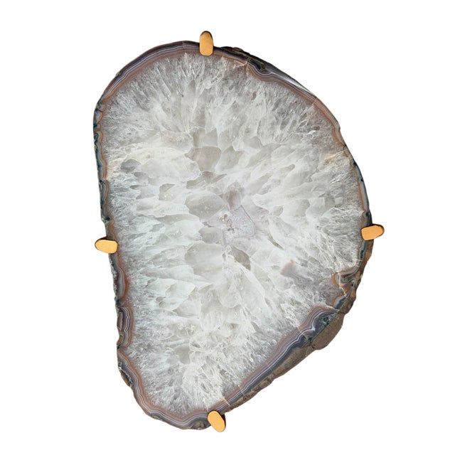 Unusual Modern Handcrafted Drinks Table. Oval Crystalized Quartzite with a narrow gray brown edge on a gilded steel base.
