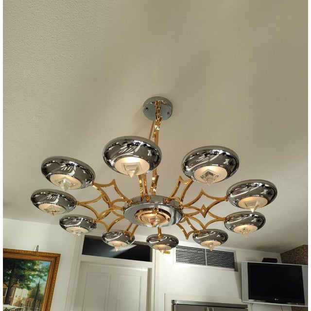 Unique Italian chandelier made of Venetian glass, produced in the prestigious Industria Veneziana Lampadari factory. This...