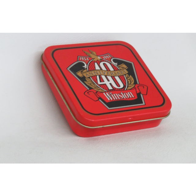 This gorgeous Winston Cigarettes 40th Anniversary lighter comes with a matching tin case. This eye catching vintage pair...