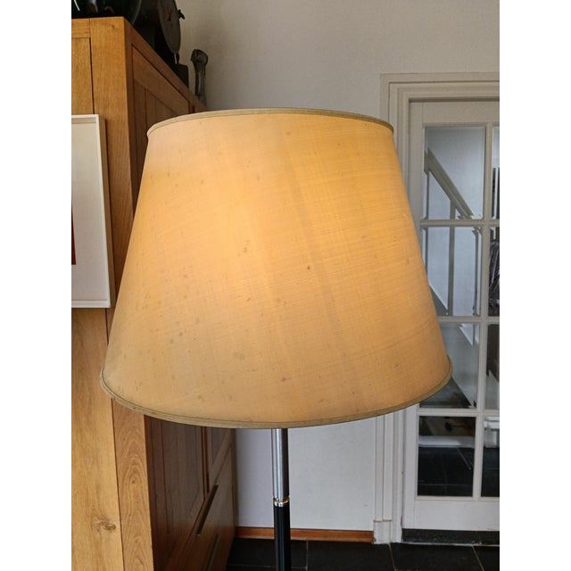 Two stunning and rare floorlamps by Angelo Lelli from thee early 1950s. Both lamps have Carrara marble round bases which...