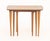 Set of Three Modern Walnut Nesting Tables, each on four tapered legs. Largest: 20" H x 26" W x 15" D. Provenance: The...
