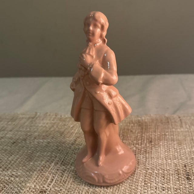 Edwardian Figure Of A Man. The detailing in the clothing and posture captures the understated sophistication typical of...