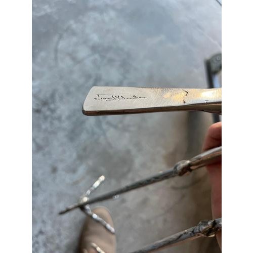 A striking pair of sculptural birds from italy, dating to the 1960s. These expressive modernist pieces reflect the...