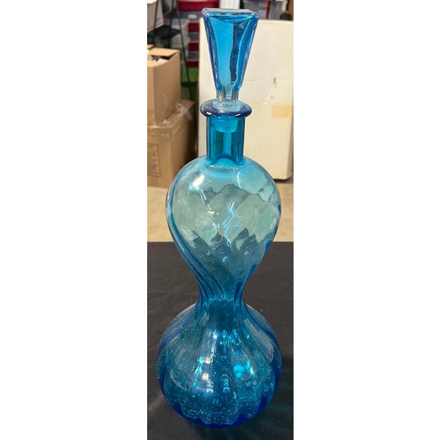 Vintage Mid Century Modern turquoise/blue ribbed glass vase with stopper. Great condition, will look great in your bar or...