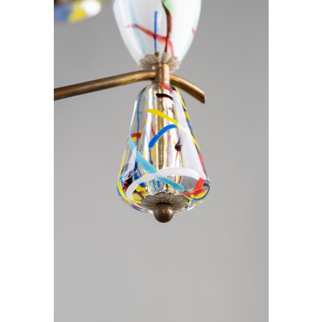 A striking italian mid-century modern chandelier designed by dino martens for aureliano toso in the 1950s.the chandelier...