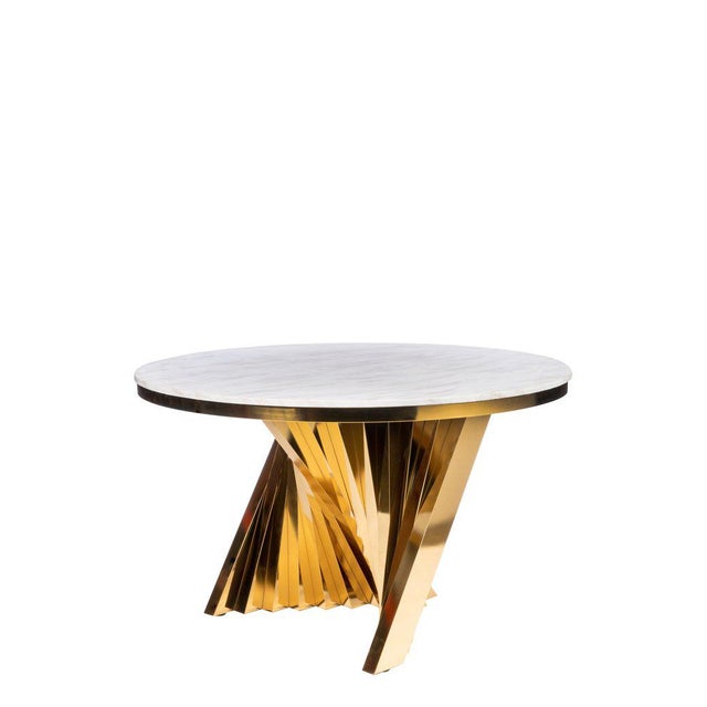 Sophisticated materials take a cue from modern geometry to create this spectacular dining table set. Gold color stainless...