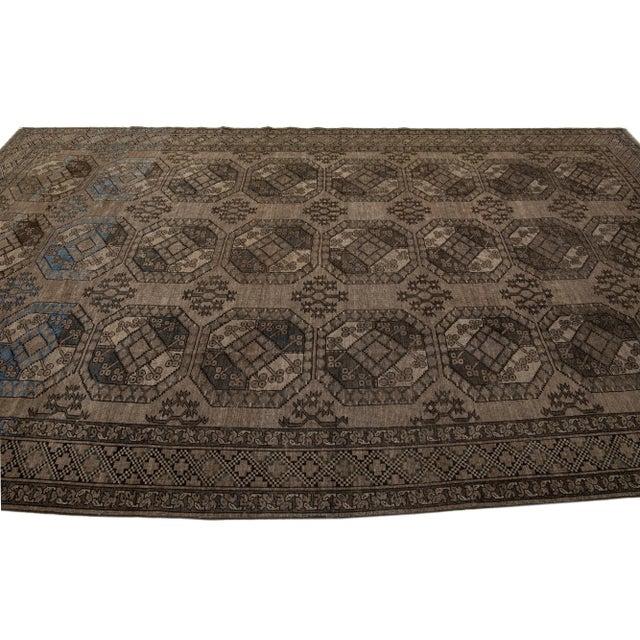 1930s Antique Turkmen Handmade Wool Brown Rug With Gul Design For Sale In New York - Image 6 of 7