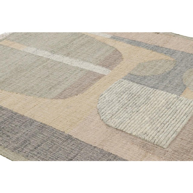 Made with handwoven wool and jute, this 6x7 contemporary flatweave rug by Rug & Kilim enjoys geometric patterns in beige,...