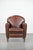 This beautifully shaped armchair is crafted from sheepskin and, thanks to its timeless design, fits into virtually any...
