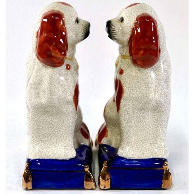 Elevate your library, shelves, or mantel with this elegant pair of Vintage Fitz and Floyd Staffordshire-Style Spaniel Dog...