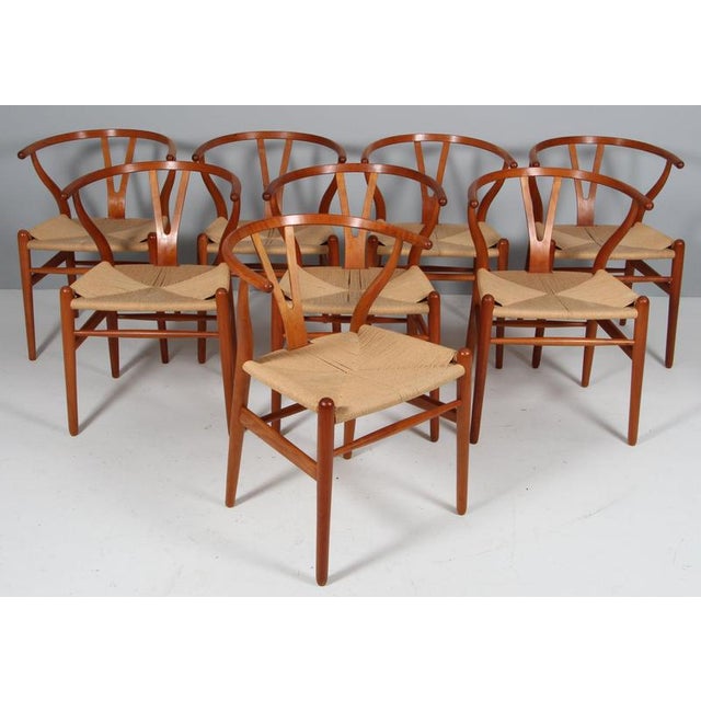 Hans J. Wegner wishbone chair in solid cherry, original papercord seat Model CH24, made by Carl Hansen This piece is...