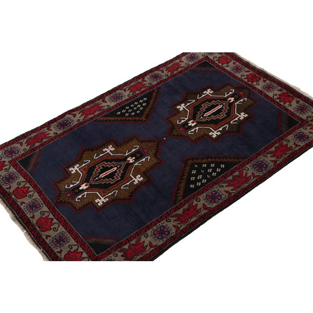 Hand knotted in wool and goat hair, this 4x6 Baluch rug represents a new line of tribal carpets in the Modern Classics...