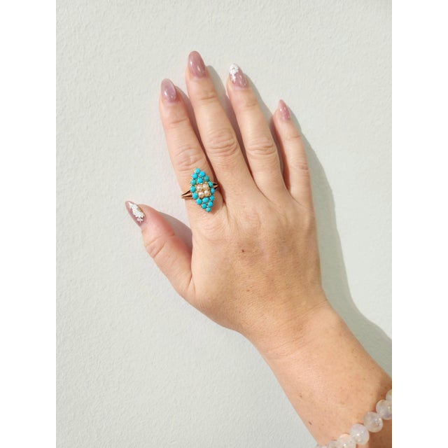 We offer free 2-day shipping! This is a Victorian style turquoise and pearl navette ring in rose gold. "Navette" in French...
