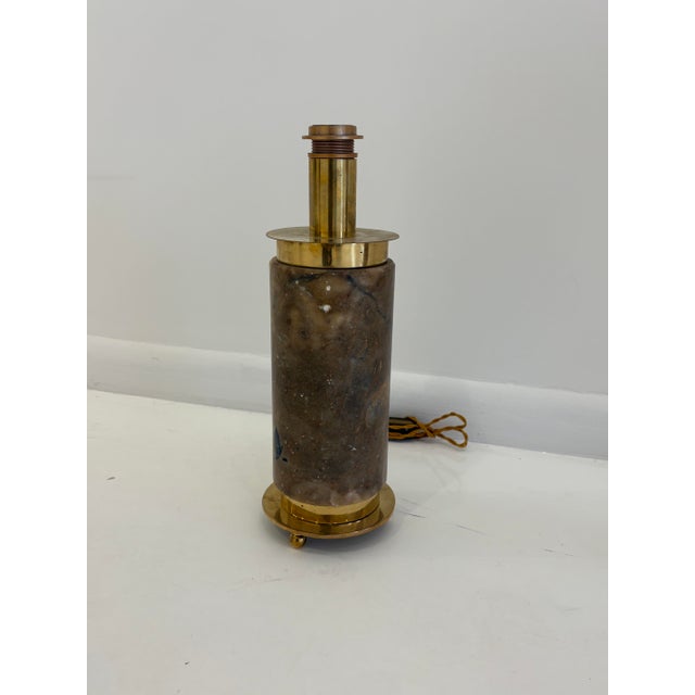 Elegant pair of Italian table lamps featuring cylindrical veined marble bodies with polished brass fittings, circular...