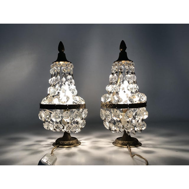 A beautiful pair of hot air balloon-shaped table or bedside lamps with crystal drops in the Louis XVI Directoire style....