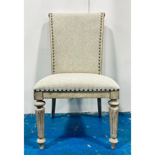 Elegant and timeless Transitional French Style Linen Dining Chairs Set of 8, antiqued beige wood frame with fluted legs,...