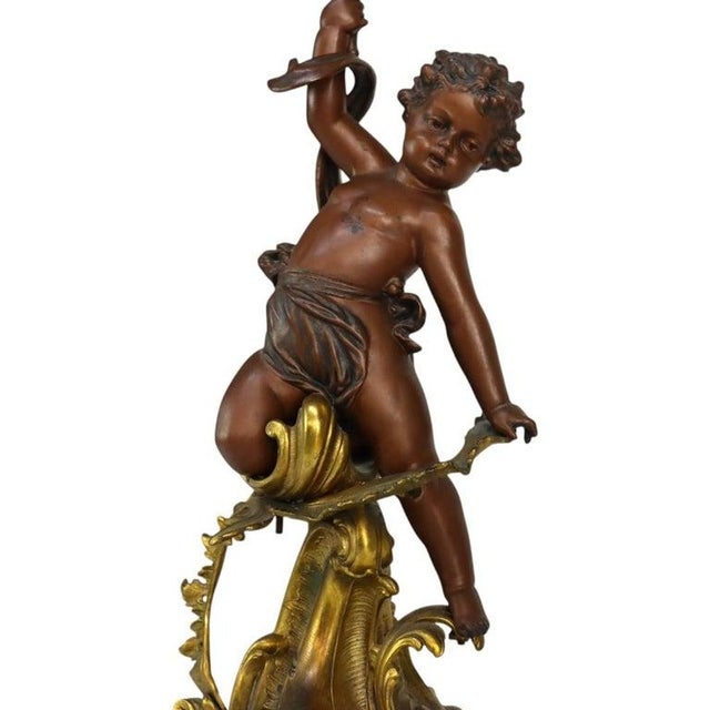 An exquisite Bradley & Hubbard Victorian figural parlor oil lamp, dating to the 19th century. The lighting fixture is...
