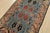 An authentic vintage tribal Heriz rug hand-knotted with fine wool on a cotton foundation. This rug features geometric...